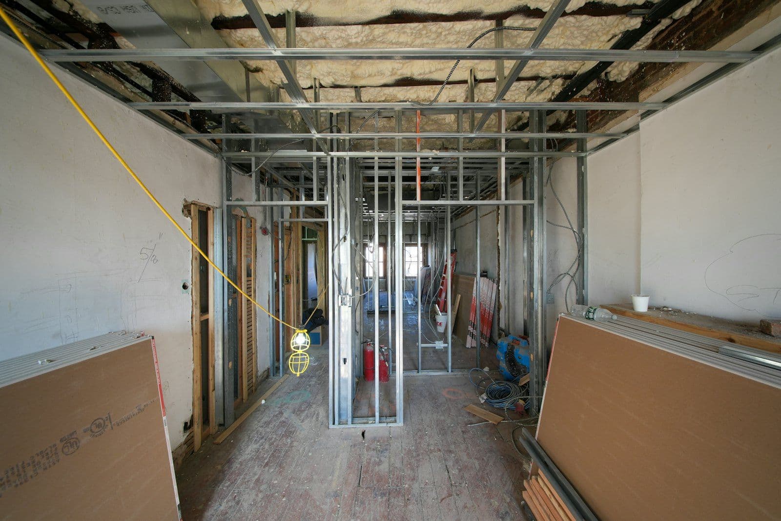 Commercial drywall installation with metal stud framing